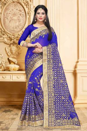 New Shade Is Here To Add Into Your Wardrobe With This Designer Saree In Violet Color Paired With Violet Colored Blouse. This Saree Is Georgette Based With Heavy Embroidery And Stone Work. 