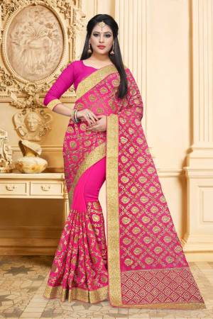 Shine Bright In This Lovely Rani Pink Colored Saree Paired With Rani Pink Colored Blouse. It IS Georgette Based Beautified With Heavy Embroidery. Buy Now.