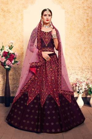 For A Royal Look, Grab This Rich Color Pallet Heavy Designer Lehenga Choli In Wine Color Paired With Contrasting Pink Colored Dupatta. This Lehenga Choli Is Satin Based Paired With Net Fabricated Dupatta. Both The Fabrics Ensures Superb Comfort Throughout The Gala.