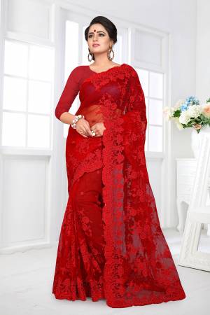 If You Are Fond Of Tone On Tone Embroidery, than This Designer Saree In Perfect For Your. This Heavy Saree And Blouse Are Fabricated On Net Beautified With Tone To Tone Heavy Resham Embroidery With Ceramic Stone Work All Over It. Buy This Saree Now.