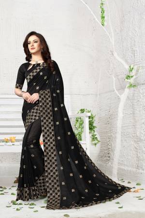 For A Bold And Beautiful Look, Grab This Designer Saree In Black. This Saree And Blouse Are Silk Fabricated Beautified With Jari Work. 