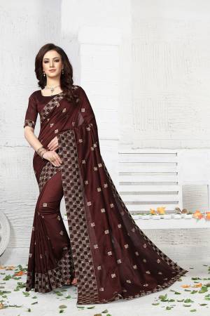 For A Bold And Beautiful Look, Grab This Designer Saree In Brown. This Saree And Blouse Are Silk Fabricated Beautified With Jari Work. 