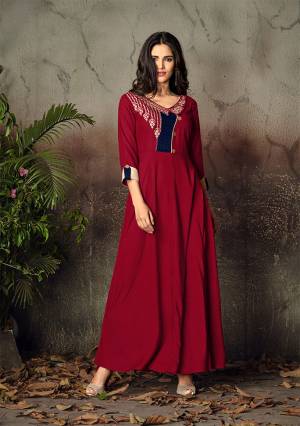 Adorn The Pretty Angelic Look Wearing This Readymade Deisgner Gown In Red Color Fabricated On Rayon Beautified With Thread Embroidery. Its Attractive Color And Embroidery Over Yoke Is Making An OverAll Beautiful Piece. Buy Now.