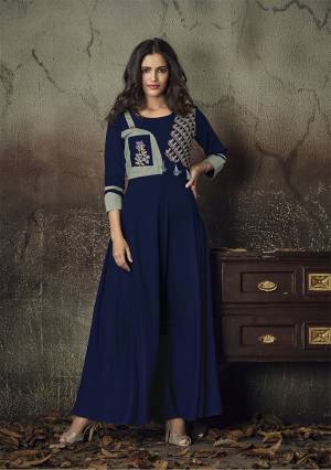 Celebrate This Festive Season With Beauty And Comfort Wearing This Designer Readymade Gown In Navy Blue Color Fabricated On Rayon. It Is Beautified With Thread Work. Its Fabric Is Soft Towards Skin And Easy To Carry All Day Long. 