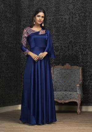 You Will Definitely Earn Lots Of Compliments Wearing This Designer Readymade Gown In Royal Blue Color Fabricated On Satin Silk. It Is Beautified With Contrasting Thread And Jari Work. Buy This Lovely Piece Now.