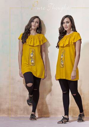 For Your Casual Or Semi-Casuals, Grab This Designer Readymade Top In Yellow Color Fabricated On Rayon. It Is Beautified Simple Thread Work And Available In All Regular Sizes. 