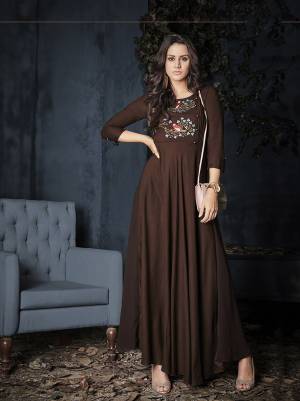 Grab This Readymade Designer Gown In Brown Color For Festive Or Semi-Casuals. This Gown Is Fabricated on Rayon beautified with Thread Work. Also Its Fabric Is Light Weight And Soft Towards Skin. 