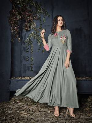 Rich And Elegant Looking Designer Readymade Gown Is Here In Grey Color Fabricated On Rayon. It Is Beautified With Contrasting Thread Work Over The Yoke. Buy This Pretty Comfortable Gown Now.