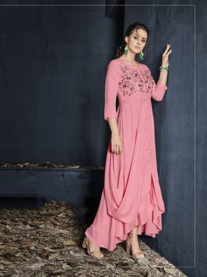 Look Pretty In This Designer Readymade Gown In Pink Color With A Graceful Drape Pattern And Thread Work. This Gown Is Fabricated On Rayon Which Is Soft Towards Skin And Ensures Superb Comfort All Day Long. 