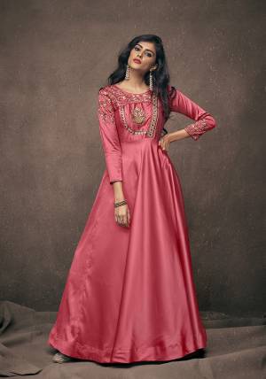 New Shade In Pink Is Here With This Designer Readymade Gown In Old Rose Pink Color Fabricated On Satin Silk. Its Rich Fabric And Color Will Definitely Earn You Lots Of Compliments From Onlookers. 