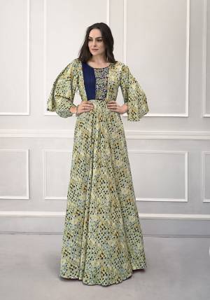 Celebrate This Festive Season With Beauty And Comfort Wearing This Designer Readymade Gown In Light Green Color Fabricated On Rayon. This Pretty Gown Has All Over Prints With Bell Sleeve Pattern. Buy Now.