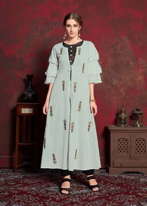 Grab This New And Trending Designer Readymade Kurti In Black And Pale Grey Which Has Pretty Jacket Pattern. Its Inner Is Fabricated On Rayon Cotton Paired With muslin Fabricated Jacket. Its Jacket IS Beautified With Thread Work Giving It An Attractive Look. 