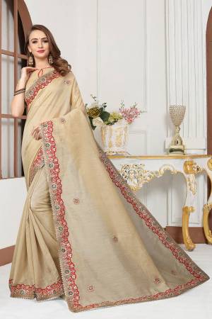 Grab This Very Beautiful Designer Saree In Grey Color For The Upcoming Festive And Wedding Season. This Saree And Blouse Are Fabricated On Cotton Silk Beautified With Heavy Embroidered Lace Border And Butti. Its Rich Fabric And Color Will Earn You Lots Of Compliments From Onlookers. 