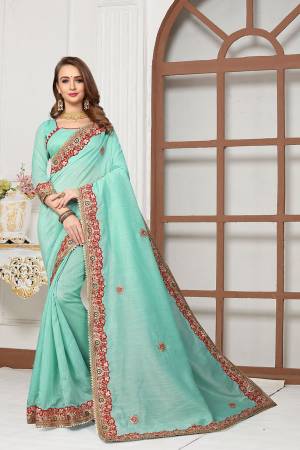 Grab This Very Beautiful Designer Saree In Grey Color For The Upcoming Festive And Wedding Season. This Saree And Blouse Are Fabricated On Cotton Silk Beautified With Heavy Embroidered Lace Border And Butti. Its Rich Fabric And Color Will Earn You Lots Of Compliments From Onlookers. 