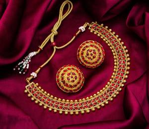 Give An Enhanced Look To Your Personality By Pairing Up This Beautiful Necklace Set With Your Ethnic Attire. This Pretty Set Is In Golden Color Beautified With Stone And Pearl Work. Buy Now.