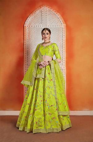 Catch All The Limelight Wearing This Designer Lehenga Choli In Neon Green Color. Its Blouse And Lehenga Are Fabricated On Art Silk Paired With Net Fabricated Dupatta. Its Color And Contrasting Embroidery Will Give An Attractive Look To Your Personality. 