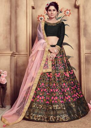 For A Bold And Beautiful Look, Grab This Heavy Designer Lehenga Choli In Black Color Paired With Pink Colored Dupatta. This Silk Based Lehenga Has Rubber Foil Print With Hand Work Over The Blouse And Net Fabricated Dupatta. Buy Now.