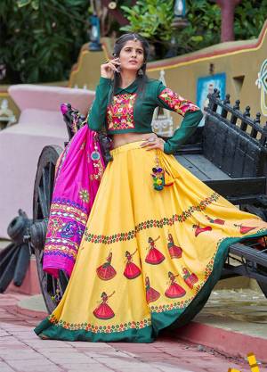 This Navratri, Adorn The Proper Traditional Look Wearing This Designer Lehenga Choli In Multi  Color. This Pretty Lehenga Choli Is Cotton Based Beautified With Multi Colored Thread Embroidery And Mirror Work. 