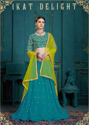 Catch All The Limelight At The Next Wedding You Attend Wearing This Designer Lehenga Choli In Blue Color Paired With Contrasting Yellow Colored Dupatta. This Lehenga Choli Is Fabricated On Georgette Paired With Net Fabricated Dupatta. Buy Now.