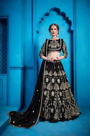 For A Bold And Beautiful Look, Grab This Attractive Looking Heavy Embroidered Designer Lehenga Choli In All Over Black Color. This Lehenga Choli Is Silk Based Paired With Net Fabricated Dupatta. Buy Now.