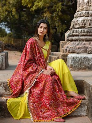 Wrap it as a shawl in winters, Wear it as a dupatta on your plain punjabi kurtas And wear it on your ethnic dresses.  It Is decorated with fancy dazzling laces and cotton tassel laces, hand dyed in different shades. The intricate big motif heavy embroidery tribal designs makes it unique and a complete handicraft product.