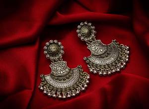 Give A Traditional Touch To Your Look With Pairing This Beautiful Pair Of Earrings In Silver Color. This Pretty Pair Can Be Paired With Any Colored Attire Which Give An Enhanced Look To Your Personality. 