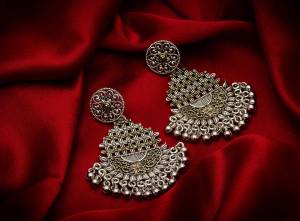 Give A Traditional Touch To Your Look With Pairing This Beautiful Pair Of Earrings In Silver Color. This Pretty Pair Can Be Paired With Any Colored Attire Which Give An Enhanced Look To Your Personality. 