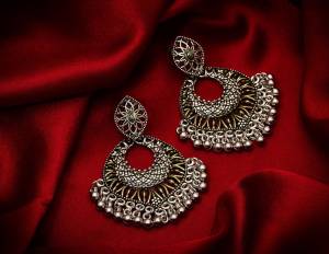 Give A Traditional Touch To Your Look With Pairing This Beautiful Pair Of Earrings In Silver Color. This Pretty Pair Can Be Paired With Any Colored Attire Which Give An Enhanced Look To Your Personality. 