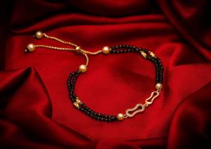 Here Is Very Pretty And Trending Mangalsutra Bracelet In Black And?Gold. This Mangalsutra Bracelet Has A Pretty Delicate Design And Pattern Which Gives An Elegant Look To Your Wrist. Buy This Latest Trend Now.?