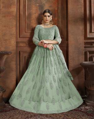 Beautiful And Elegant Looking Shade Is Here To Add Into Your Wardrobe With This Heavy Designer Lehenga Choli In Pastel Green Color. This Lehenga Choli And Dupatta Are Fabricated On Net Beautified With Heavy Detailed Embroidery. Buy Now.