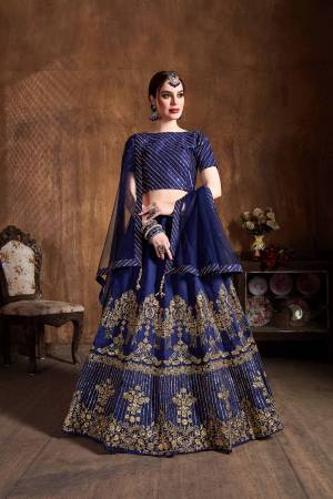 You Will Definitely Earn Lots Of Compliments Wearing This Heavy Designer Lehenga Choli In Royal Blue Color. This Pretty Designer Embroidered Lehenga Choli Is Fabricated On Art Silk Paired With Net Fabricated Dupatta. Buy This Lehenga Choli Now.