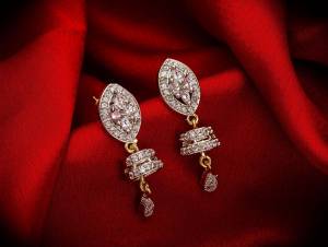 Here Is A Very Pretty Pair Of Simple And Elegant Looking Earring?Set In Golden Color. It Has Pretty Unique pattern With Attractive Diamond Work. You can Pair This Even With Simple Attire As Well As A Heavy One. This Pretty Evergreen Design Compliments Any Kind Of Attire You Wear.