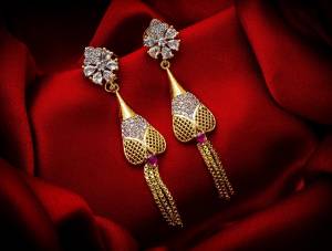 Here Is A Very Pretty Pair Of Simple And Elegant Looking Earring Set In Golden Color. It Has Pretty Unique pattern With Attractive Diamond Work. You can Pair This Even With Simple Attire As Well As A Heavy One. This Pretty Evergreen Design Compliments Any Kind Of Attire You Wear.?