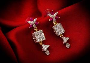 Here Is A Very Pretty Pair Of Delicate And Elegant Looking Earring Set In Golden Color. It Has Pretty Unique pattern With Attractive Diamond Work. You can Pair This Even With Simple Attire As Well As A Heavy One. This Pretty Evergreen Design Compliments Any Kind Of Attire You Wear.?