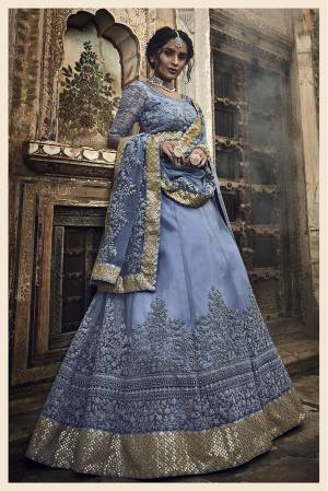 New Shade Is Here To Add Into Your Wardrobe With This Heavy Designer Lehenga Choli In Powder Blue Color. This Pretty Lehenga Choli Is Fabricated On Net Beautified With Lovely Tone To Tone Embroidery. Buy Now.