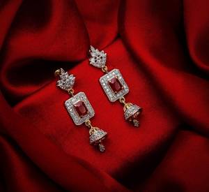 Here Is A Very Pretty Pair Of Simple And Elegant Looking Earring Set In Golden Color. It Has Pretty Unique pattern With Attractive Diamond Work. You can Pair This Even With Simple Attire As Well As A Heavy One. This Pretty Evergreen Design Compliments Any Kind Of Attire You Wear.