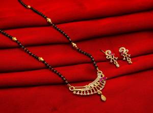 Grab This Designer Heavy Mangalsutra In Golden And Black Color Beautified With Diamond Work. This Mangalsutra Comes With A Set Of Pretty Matching Earrings. It Is Light In Weight And Easy To Carry Throughout The Gala. Buy Now.