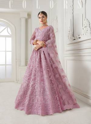 Look Ravishing Wearing This Heavy Deisgner Lehenga Choli In All Over Baby Pink Color. Its Detailed Embroidered Blouse, Lehenga And Dupatta Are Fabricated Net Beautified With Elegant Tone To Tone Resham And Coding Work Highlited With Stones. Buy This Heavy Yet Subtle Look Designer Lehenga Choli Now.