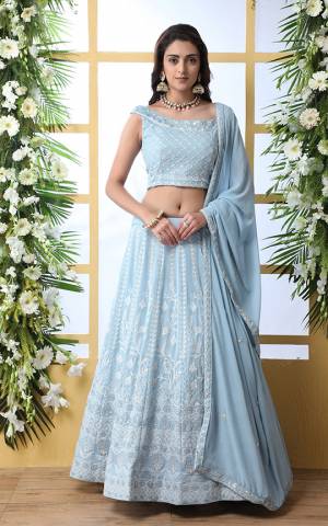 Get Ready For The Upcoming Wedding Season Wearing This Heavy Designer Lehenga Choli In Sky Blue Color. This Pretty Lehenga Choli Is Fabricated On Georgette Beautified With Heavy Embroidery And Sequence Work. Buy Now.