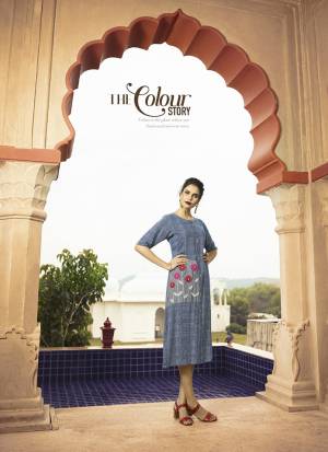 Add This Readymade Kurti To Your Wardrobe In Navy Blue Color Fabricated On Rayon. It Is Beautified With Checks Prints And Floral Thread Work. 