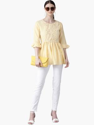 Grab This Pretty Readymade Top In Light Yellow Color Fabricated On Muslin. Pair This Up With Black Or Blue Colored Denim. Buy This Top Now.