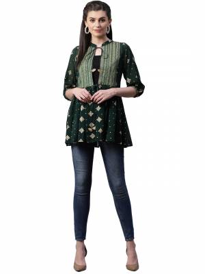 Be It Your College, Home Or Work Place This Readymade Top Is Suitable For All. This Lovely Dark Green Colored Top Is Muslin Based, Its Rich Color And Fabric Will Earn You Lots Of Compliments From Onlookers.