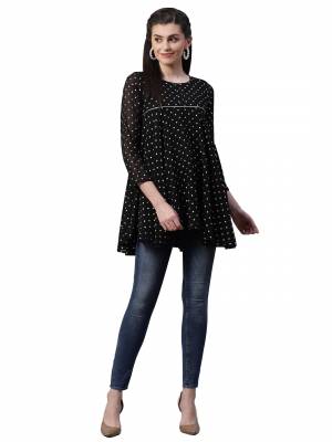 Grab This Pretty Readymade Top In Black Color Fabricated On Muslin. Pair This Up With Black Or Blue Colored Denim. Buy This Top Now.