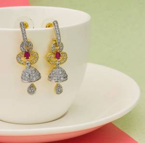 Grab This Pretty Earrings Set In Golden Color. This Lovely Design Is Beautified With Attractive Diamond Work. You Can Pair This Up With Any Colored Attire. Buy This Pretty Piece Now