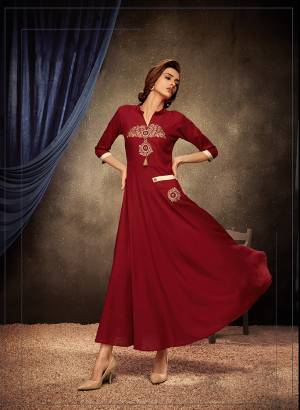 Add This Pretty Readymade Designer Gown To Your Wardrobe In Red Color. This Pretty Gown Is Fabricated On Rayon Beautified With Thread Embroidery. Its Fabric Is Soft Towards Skin, Light Weight And Easy To Carry All Day Long. 