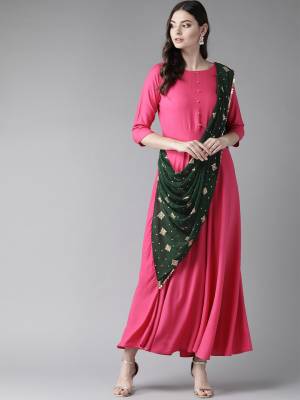 Look Pretty In This Readymade Designer Indo-Western Dress In Dark Pink Color. This Pretty Dress Is Fabricated On Rayon Attached With A Pretty Dark Green Dupatta With Lace Border. Its Fabric IS Soft Towards Skin And Ensures Superb Comfort All Day Long. 