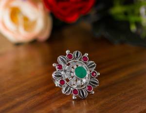 Here Is A Pretty Traditional Looking Ring In Silver Color In Oxidize Material. This Pretty Ring Is Beautified With Multi Color Stone Work And You Can Pair This Up With Any Colored Traditional Attire. Buy Now.