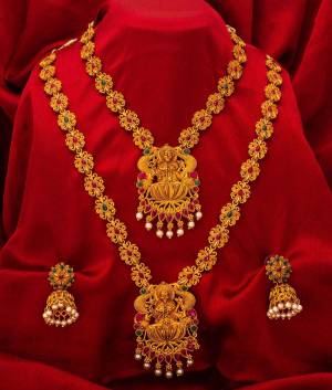 For A Queen Look, Here Is A Designer Royal Looking Necklace Set With Two Necklaces With A Pair Of Earrings. This Necklace Set Can Be Paired With Heavy Or Light Ethnic Attire Alos Can Be Wore Single Or Both At A Time For More Enhanced Look. Buy Now