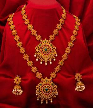 To Give A Heavy Tradiotional Look, Grab This Beautiful Set Of Necklace Which Contains Two Necklaces And A Pair Of Earring. This Necklace Set Can Be Paired With Any Colored Traditional Attire And Also Can Be Wore Both At A Time Or Single As Per The Occasion