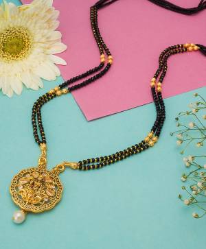 Grab This Double Chained Traditional Patterned Magalsutra Which Has An Attatched Pendant. This Mangalsutra Can Be Paired With Any Colored Traditional Attire And Suitable For Occasion Wear. Buy Now